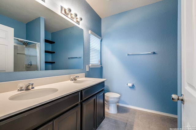 1614 Desert Candle, San Antonio, TX 78245 - bathroom with double vanity, an enclosed shower, and tile patterned flooring