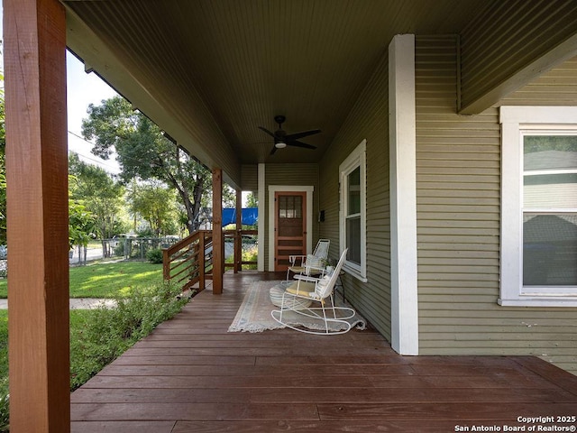 211 W High Ave, San Antonio, TX 78210 - wooden terrace featuring a ceiling fan and a yard
