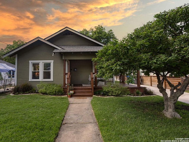 211 W High Ave, San Antonio, TX 78210 - view of front facade featuring a porch and roof with shingles