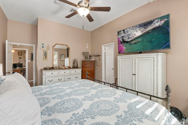 8826 Lost Bnd, San Antonio, TX 78240 - bedroom featuring arched walkways, a textured ceiling, and ceiling fan