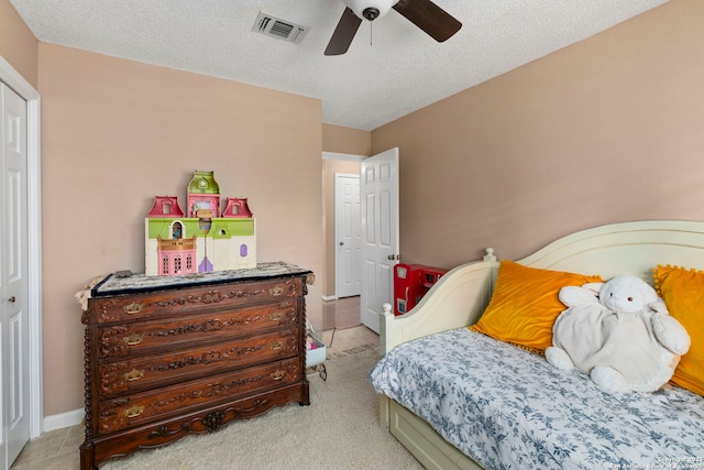 8826 Lost Bnd, San Antonio, TX 78240 - bedroom with a ceiling fan and a textured ceiling