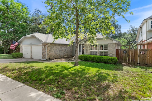 8826 Lost Bnd, San Antonio, TX 78240 - view of front of house featuring brick siding, an attached garage, concrete driveway, and a gate