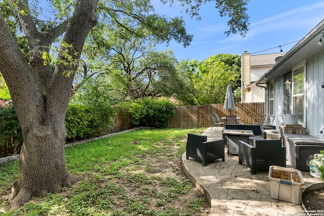 8826 Lost Bnd, San Antonio, TX 78240 - fenced backyard featuring an outdoor hangout area and a patio area