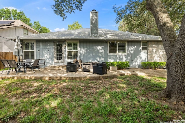 8826 Lost Bnd, San Antonio, TX 78240 - back of property featuring a patio area, a chimney, and entry steps