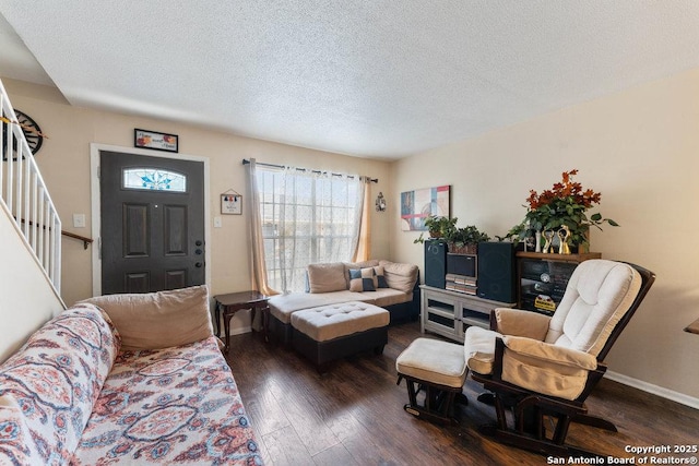 6611 Southpoint St Unit B124, San Antonio, TX 78229 - living room with hardwood / wood-style floors, stairway, a textured ceiling, and baseboards