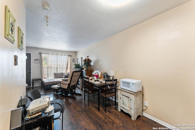 6611 Southpoint St Unit B124, San Antonio, TX 78229 - office space featuring dark wood finished floors, a textured ceiling, and baseboards