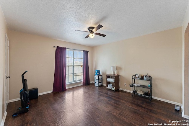 6611 Southpoint St Unit B124, San Antonio, TX 78229 - misc room featuring ceiling fan, wood finished floors, a textured ceiling, and baseboards