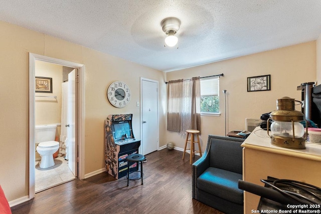 6611 Southpoint St Unit B124, San Antonio, TX 78229 - office area with dark wood-type flooring, a textured ceiling, baseboards, and ceiling fan