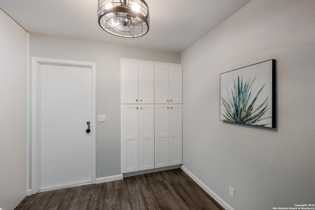 9723 Five Forks St, San Antonio, TX 78245 - unfurnished bedroom with dark wood-type flooring and baseboards