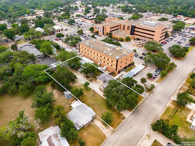 571 Houston, New Braunfels, TX 78130 - aerial overview of property's location featuring property boundaries highlighted