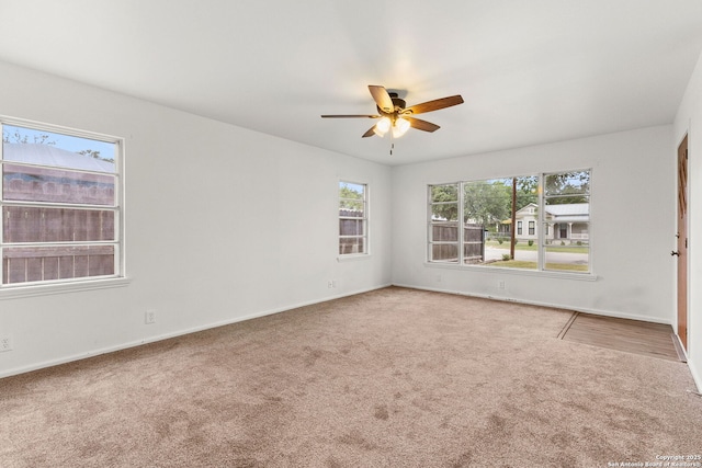 571 Houston, New Braunfels, TX 78130 - empty room with carpet, ceiling fan, and baseboards