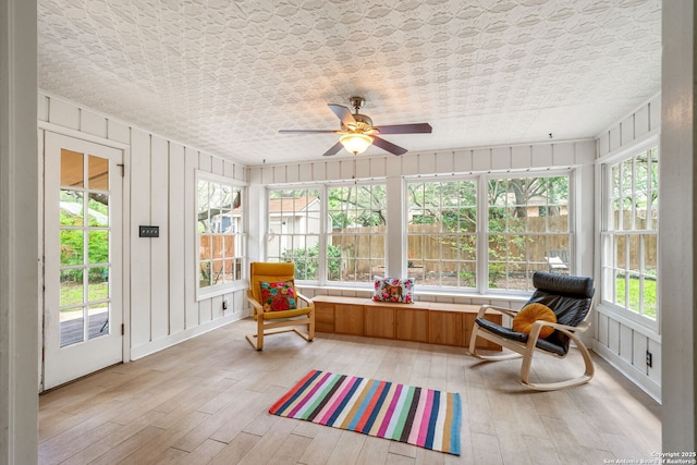 308 Sagecrest, Hollywood Park, TX 78232 - sunroom with wood-type flooring and plenty of natural light