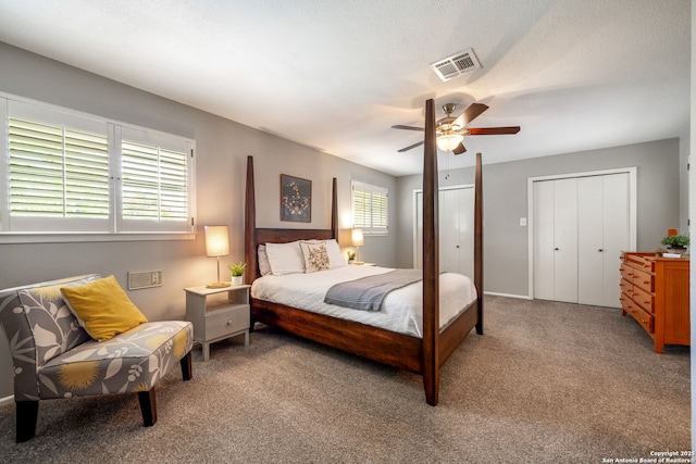308 Sagecrest, Hollywood Park, TX 78232 - bedroom featuring carpet flooring, two closets, and a ceiling fan