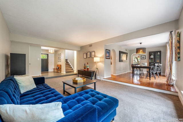 308 Sagecrest, Hollywood Park, TX 78232 - carpeted living area with stairway and baseboards