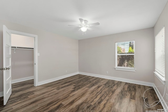129 Odell, San Antonio, TX 78212 - unfurnished bedroom featuring dark wood-style floors, baseboards, a closet, and a ceiling fan
