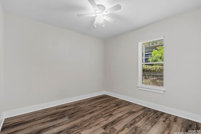 129 Odell, San Antonio, TX 78212 - empty room with dark wood-style floors, baseboards, and a ceiling fan