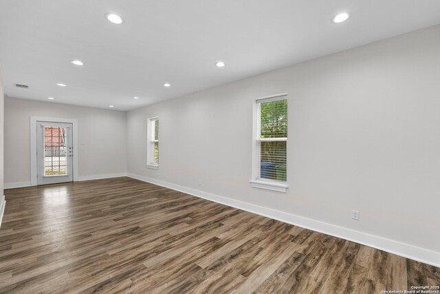 129 Odell, San Antonio, TX 78212 - empty room featuring healthy amount of natural light, dark wood-type flooring, recessed lighting, and baseboards