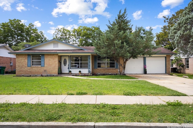 5026 Lakewood, San Antonio, TX 78220 - ranch-style home featuring brick siding, a front yard, a garage, concrete driveway, and cooling unit
