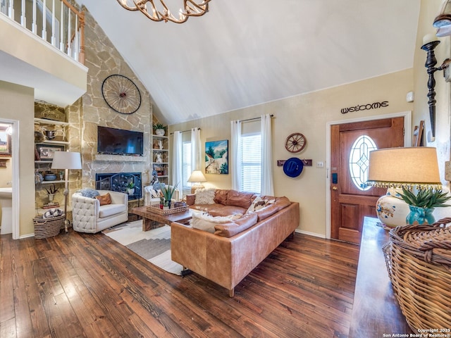 1614 Sunnybrook, New Braunfels, TX 78130 - living room featuring wood-type flooring, built in features, a fireplace, high vaulted ceiling, and baseboards