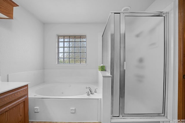 14053 Huber, Seguin, TX 78155 - full bath with vanity, a whirlpool tub, and a stall shower