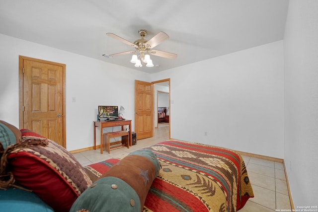 14053 Huber, Seguin, TX 78155 - bedroom featuring light tile patterned floors, baseboards, and ceiling fan