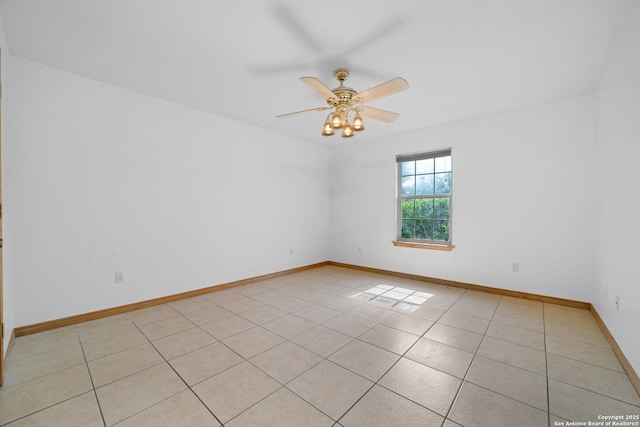 14053 Huber, Seguin, TX 78155 - spare room featuring light tile patterned floors, a ceiling fan, and baseboards