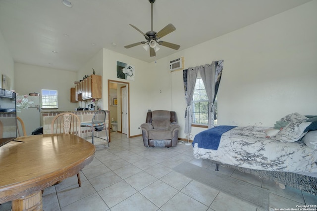 14053 Huber, Seguin, TX 78155 - bedroom with multiple windows, an AC wall unit, light tile patterned floors, and freestanding refrigerator