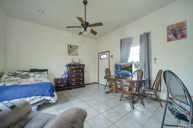 14053 Huber, Seguin, TX 78155 - bedroom featuring vaulted ceiling, light tile patterned flooring, and baseboards