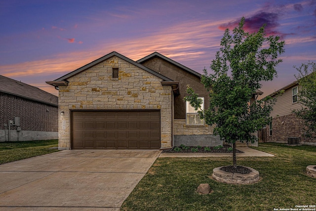 2196 New Castle, New Braunfels, TX 78130 - french country style house with concrete driveway, a front lawn, and stone siding