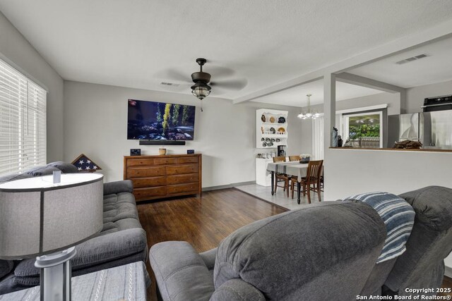 403 Dawnview Ln, San Antonio, TX 78213 - living room with a chandelier, healthy amount of natural light, wood finished floors, and ceiling fan
