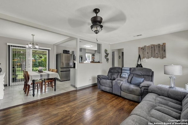 403 Dawnview Ln, San Antonio, TX 78213 - living area featuring a chandelier, a ceiling fan, and wood finished floors