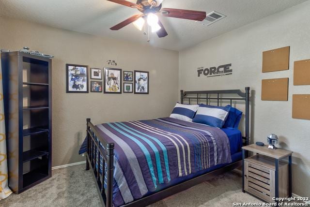 331 Primrose, New Braunfels, TX 78132 - bedroom with carpet floors and ceiling fan