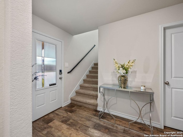22146 Pivot Pt, San Antonio, TX 78261 - entrance foyer featuring stairway, dark wood-style flooring, and baseboards