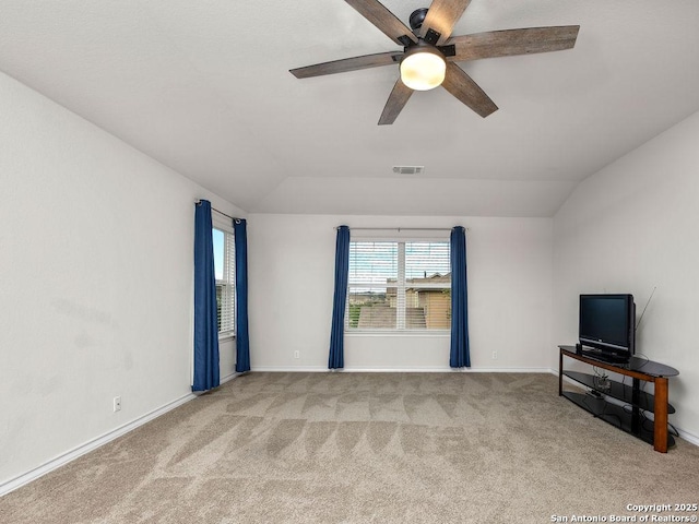 22146 Pivot Pt, San Antonio, TX 78261 - unfurnished living room featuring a ceiling fan, carpet flooring, lofted ceiling, and baseboards