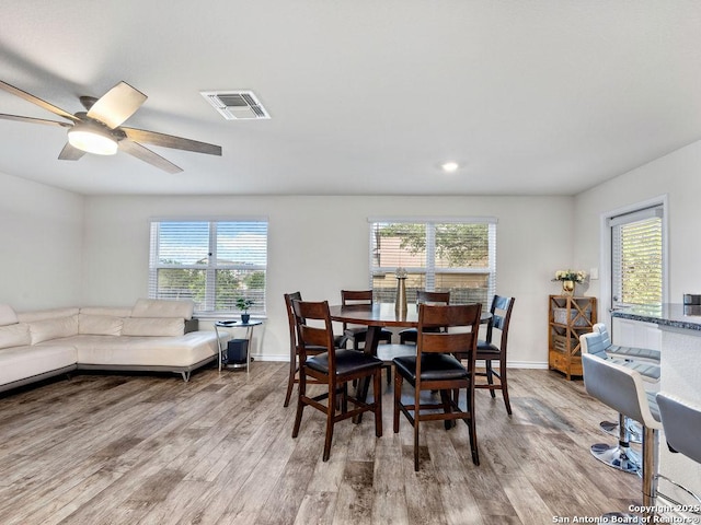 22146 Pivot Pt, San Antonio, TX 78261 - dining area featuring plenty of natural light, wood finished floors, ceiling fan, and recessed lighting