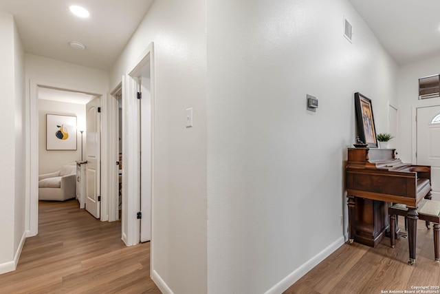 13755 Cedar Cyn, San Antonio, TX 78231 - hall featuring light wood finished floors, baseboards, and recessed lighting