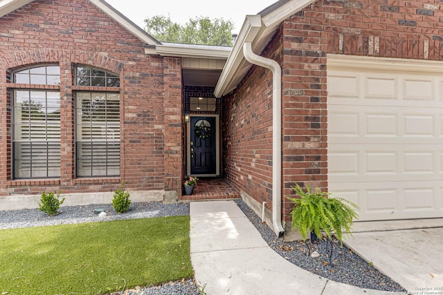 13755 Cedar Cyn, San Antonio, TX 78231 - property entrance featuring an attached garage and brick siding