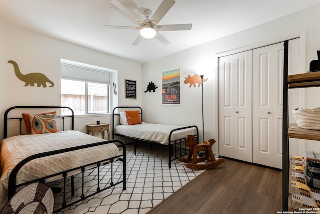13755 Cedar Cyn, San Antonio, TX 78231 - bedroom with wood finished floors, a closet, and ceiling fan