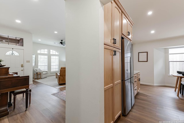 13755 Cedar Cyn, San Antonio, TX 78231 - kitchen featuring stainless steel refrigerator, light brown cabinets, ceiling fan, wood finished floors, and recessed lighting