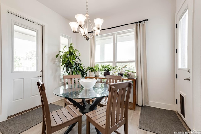 17703 San Felipe Bay, San Antonio, TX 78255 - dining area with a chandelier and baseboards