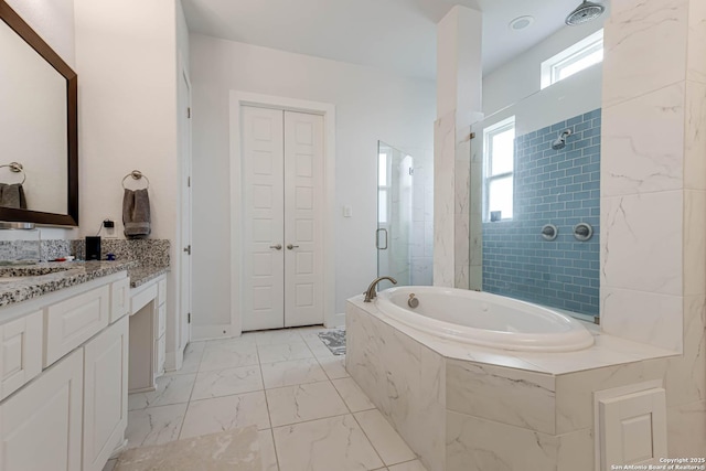 17703 San Felipe Bay, San Antonio, TX 78255 - full bath featuring tiled shower, vanity, a garden tub, and marble finish flooring