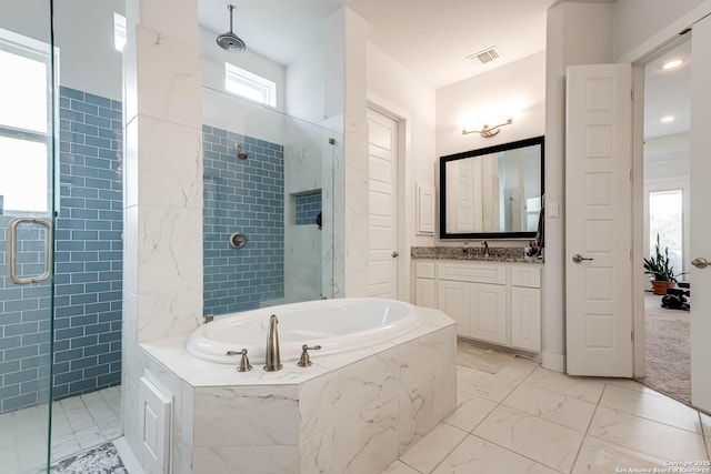 17703 San Felipe Bay, San Antonio, TX 78255 - bathroom featuring a shower stall, a garden tub, vanity, and marble finish floors