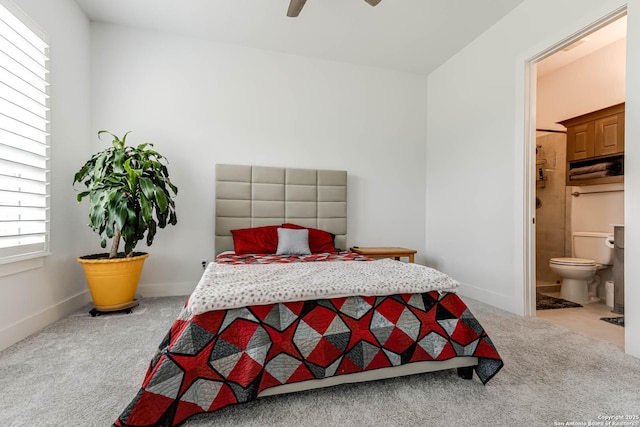 17703 San Felipe Bay, San Antonio, TX 78255 - carpeted bedroom with ensuite bathroom, ceiling fan, and baseboards