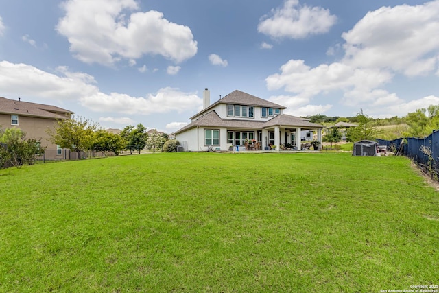 17703 San Felipe Bay, San Antonio, TX 78255 - rear view of property with a chimney and a patio area