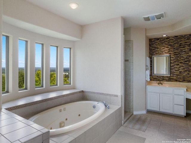 1280 Mystic Pkwy, Spring Branch, TX 78070 - full bath with a tub with jets, vanity, a stall shower, decorative backsplash, and tile patterned flooring