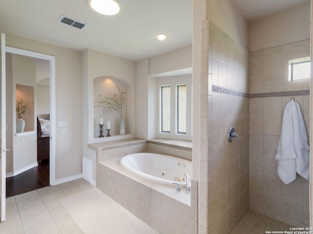 1280 Mystic Pkwy, Spring Branch, TX 78070 - full bathroom featuring a tub with jets, tile patterned floors, a tile shower, and connected bathroom
