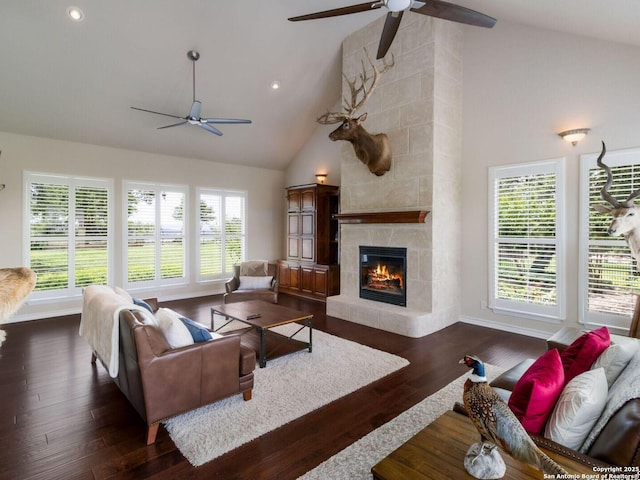 1280 Mystic Pkwy, Spring Branch, TX 78070 - living room featuring ceiling fan, high vaulted ceiling, a tile fireplace, dark wood-style floors, and recessed lighting