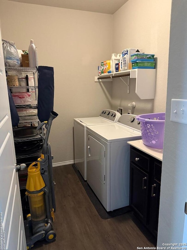 6874 Comanche Cougar, San Antonio, TX 78233 - washroom with washing machine and clothes dryer, dark wood-type flooring, and baseboards