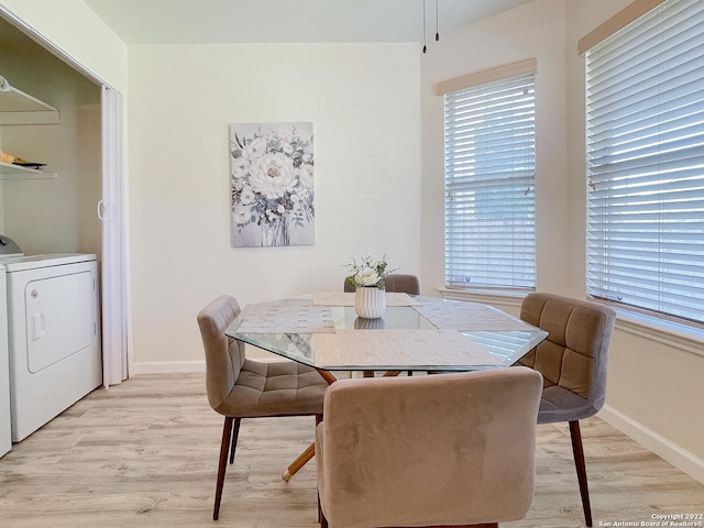 11427 Baltic Dr, San Antonio, TX 78213 - dining room featuring washer / clothes dryer, light wood-style flooring, baseboards, and healthy amount of natural light
