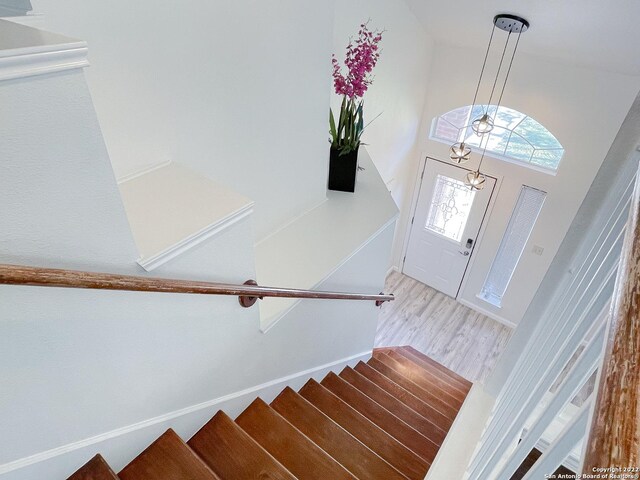 11427 Baltic Dr, San Antonio, TX 78213 - staircase with wood finished floors and a high ceiling